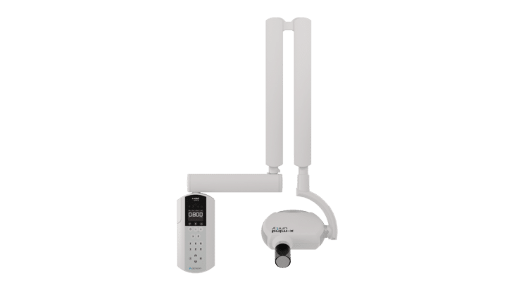 Vue de face de la radio dentaire vétérinaire X-Mind Unity sur fond blanc : bras articulé blanc plié en deux segments verticaux et un segment horizontal, panneau de commande avec écran affichant 0.800 à gauche, tête émettrice blanche arrondie suspendue à droite, avec son cône noir orienté vers le bas.